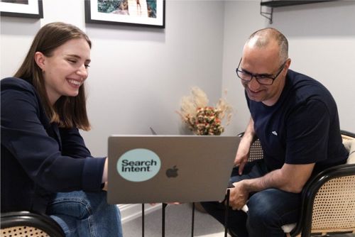 Happy people looking at the laptop